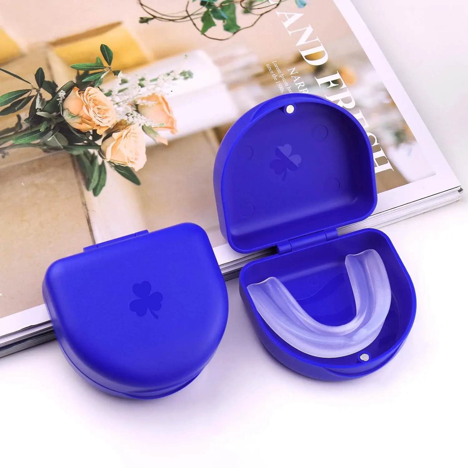 Dark blue ARGOMAX aligner case with magnetic clasp, a slim and hygienic container for safely storing orthodontic aligners or retainers, protecting them from damage and unsanitary conditions.