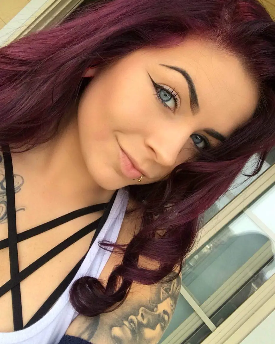 Bottle of Arctic Fox Ritual semi-permanent hair dye, a vibrant burgundy color for achieving long-lasting, cruelty-free results.