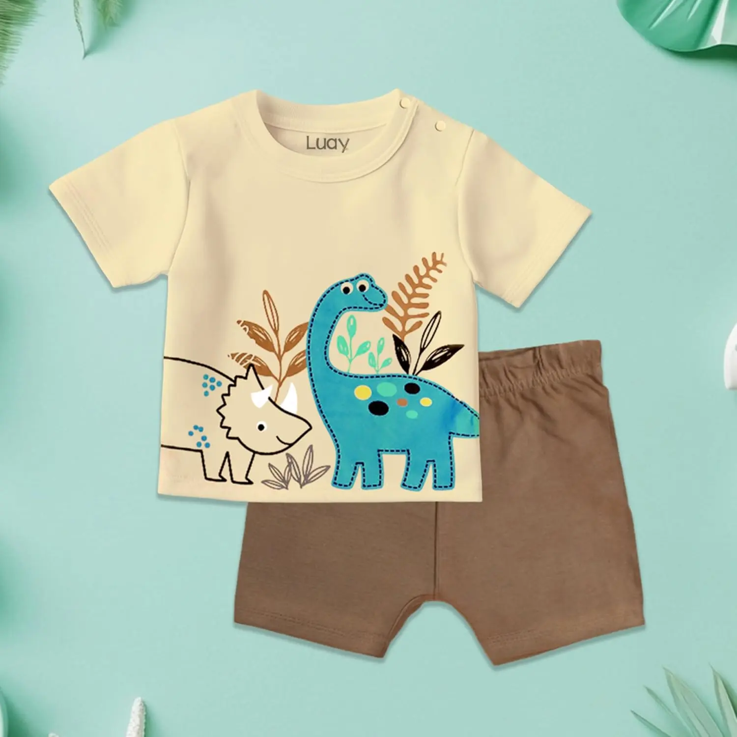 Adorable and practical LUAY baby clothes set featuring a playful design with colorful symbols on a soft, machine-washable cotton blend, perfect for gifting.