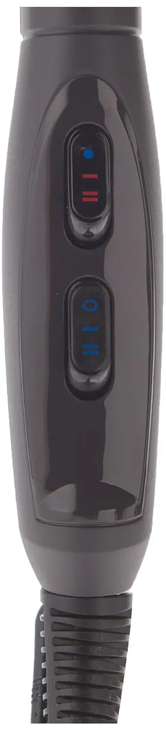 Black BaByliss Paris hair dryer with 2100W salon-grade motor and ionic technology, featuring an ultra-slim concentrator nozzle for precise styling and frizz control, crafted in Italy.