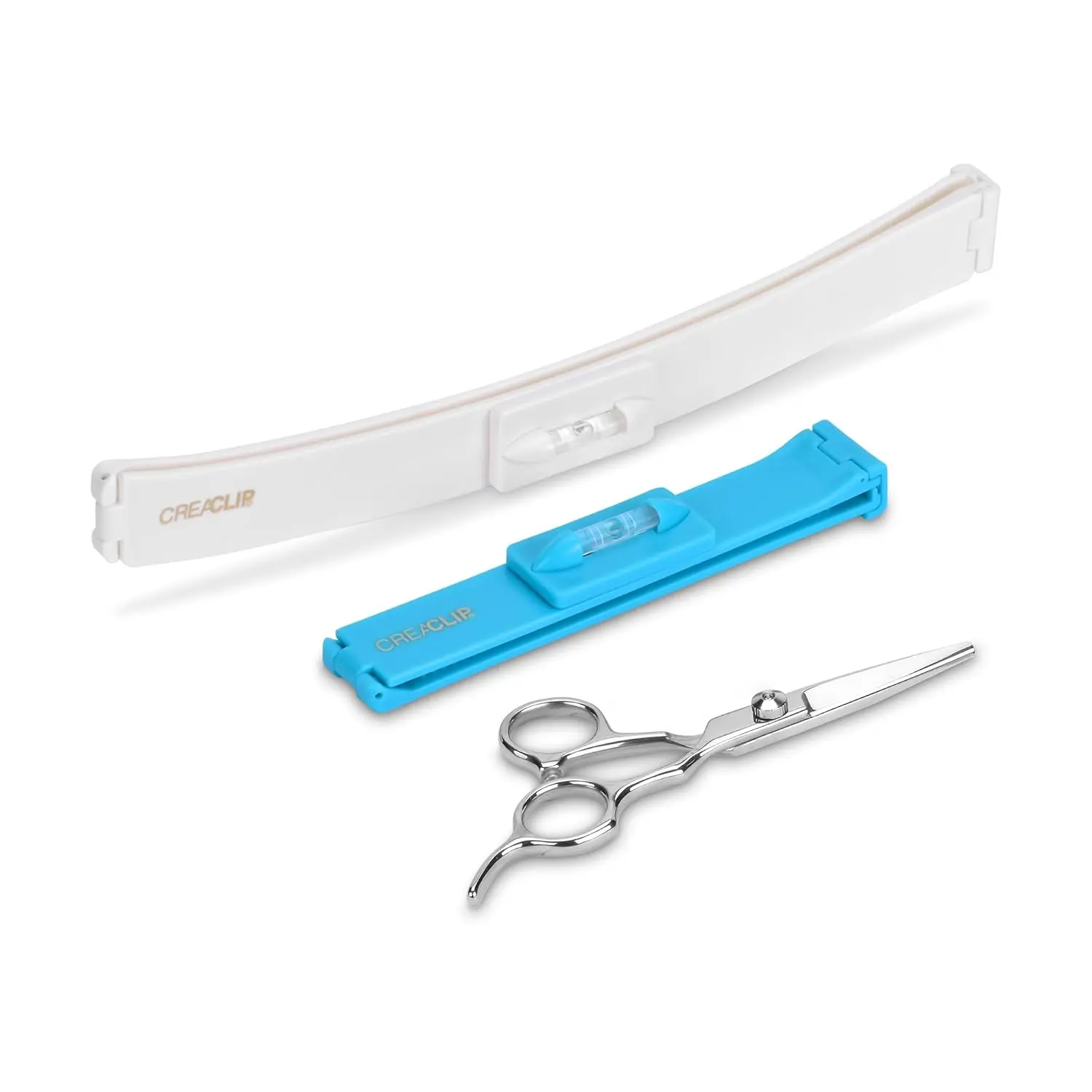 This image shows the CreaClip set and scissors by CreaProducts, a DIY hair cutting tool for styling layers, bangs, bobs and trims at home.