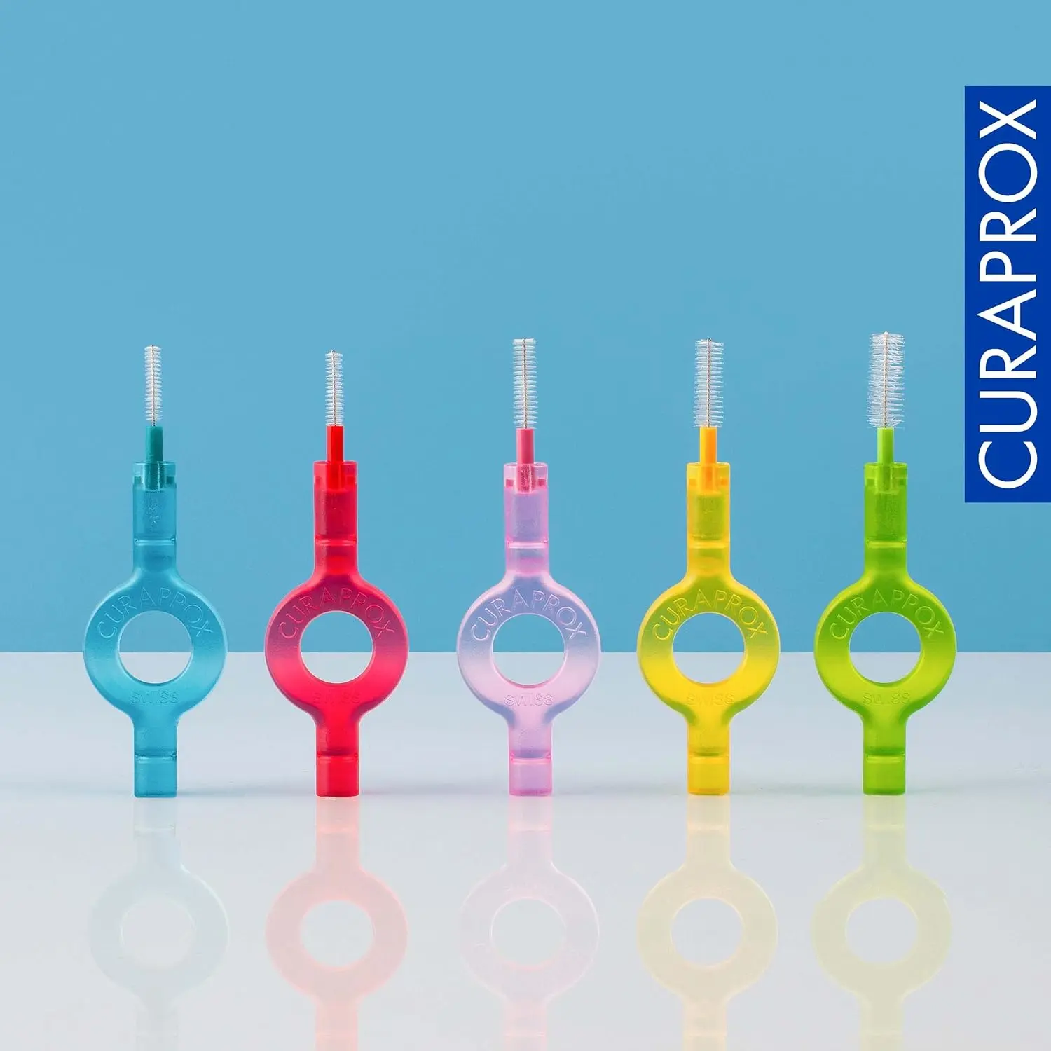 Eight red Curaprox CPS 07 Prime interdental brush refills with ultra-fine 0.7mm bristles for effective cleaning and plaque removal in tight spaces.