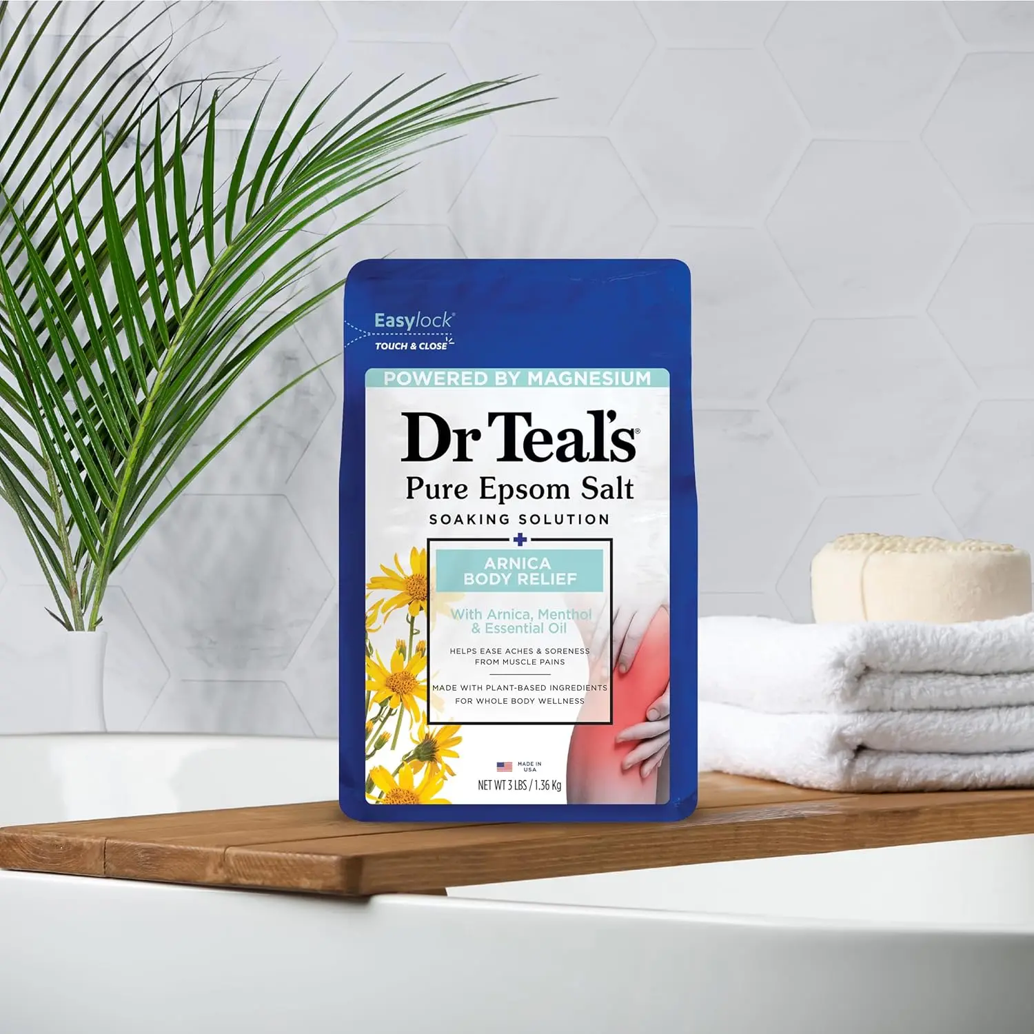 Dr Teal's Epsom Salt soak with arnica and menthol helps to relieve muscle aches and soreness with magnesium sulfate and eucalyptus essential oil for a relaxing bath.