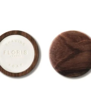 Floris London No.89 shaving soap in a wooden bowl, featuring woody aromas and shea butter for a close, smooth shave.