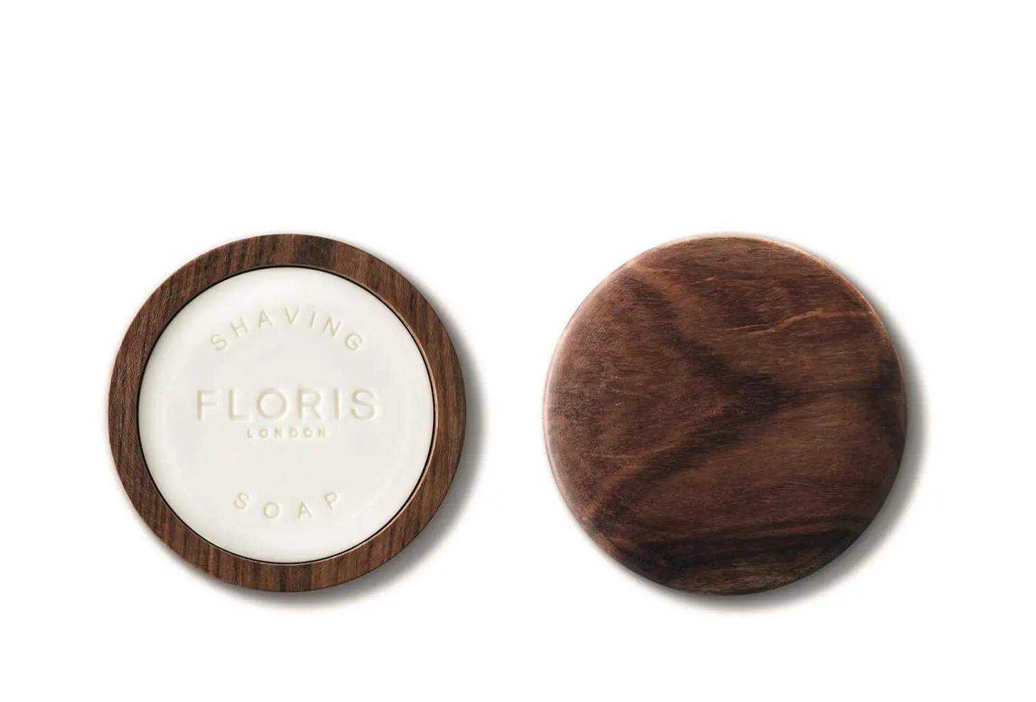 Floris London No.89 shaving soap in a wooden bowl, featuring woody aromas and shea butter for a close, smooth shave.