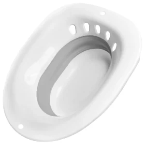 Gray foldable sitz bath basin placed on a toilet, designed for hemorrhoid treatment, postpartum recovery, and use by pregnant women and the elderly, featuring anti-overflow holes and a space-saving design.