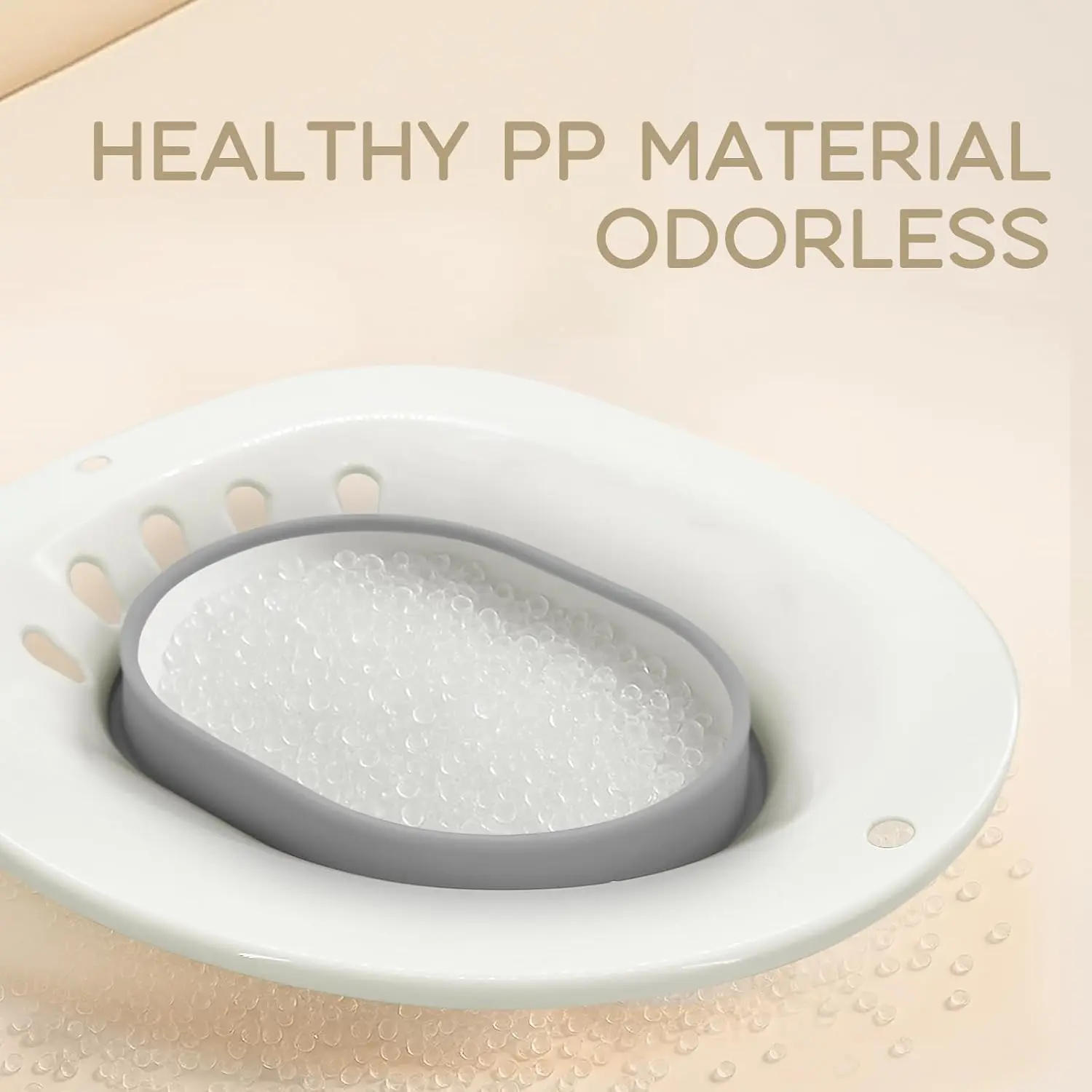 Gray foldable sitz bath basin placed on a toilet, designed for hemorrhoid treatment, postpartum recovery, and use by pregnant women and the elderly, featuring anti-overflow holes and a space-saving design.