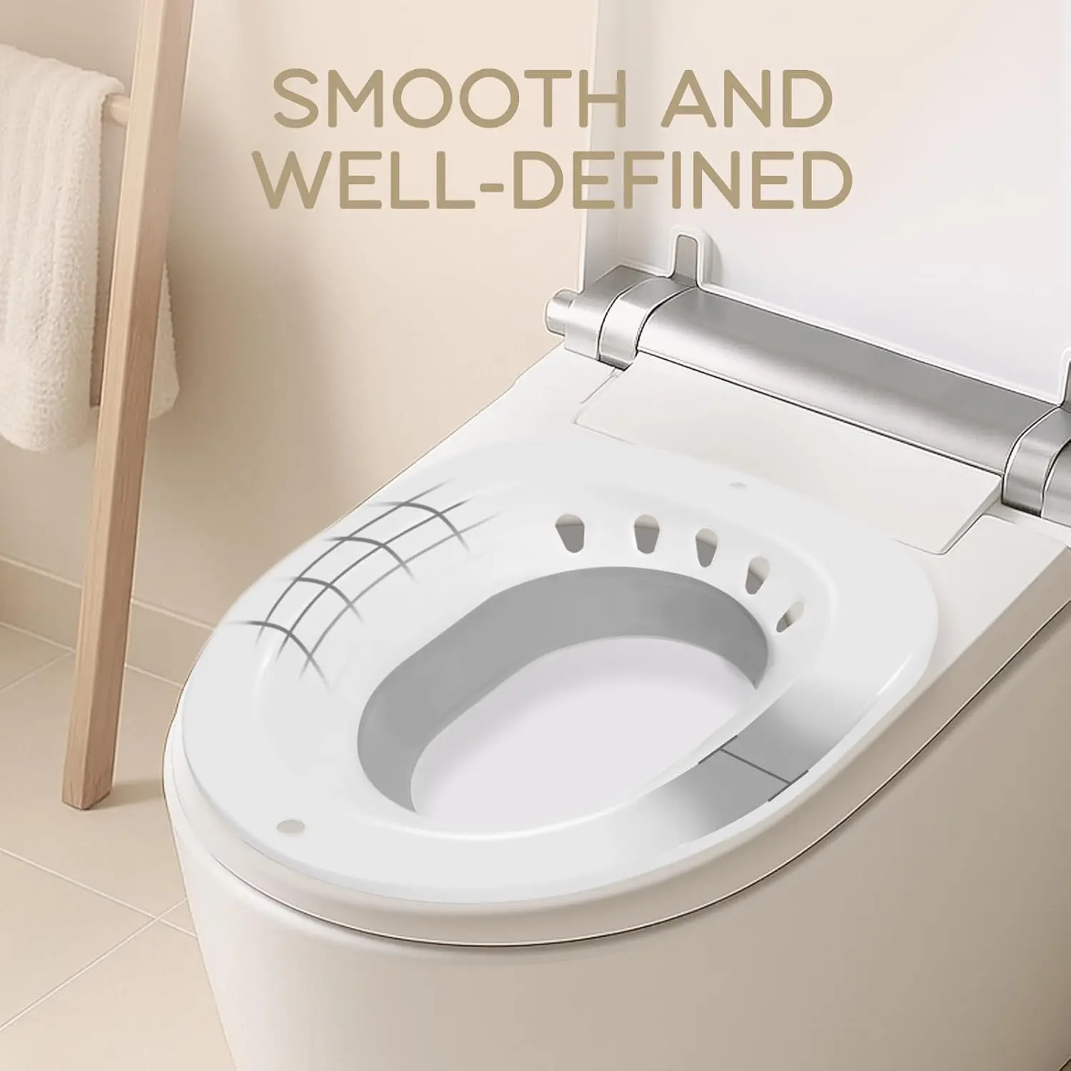 Gray foldable sitz bath basin placed on a toilet, designed for hemorrhoid treatment, postpartum recovery, and use by pregnant women and the elderly, featuring anti-overflow holes and a space-saving design.