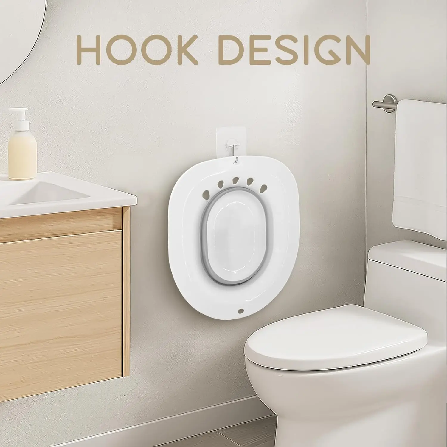 Gray foldable sitz bath basin placed on a toilet, designed for hemorrhoid treatment, postpartum recovery, and use by pregnant women and the elderly, featuring anti-overflow holes and a space-saving design.