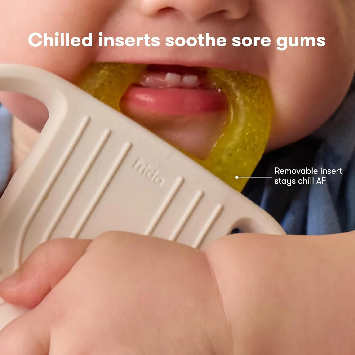 Frida Baby silicone teether with multiple textured surfaces provides safe, BPA-free teething relief for babies, featuring a room temperature handle.