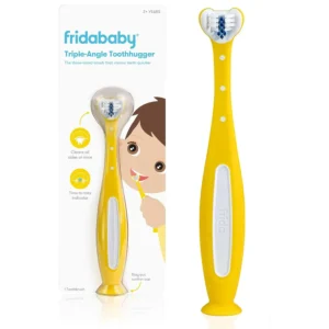 A Frida Baby Toothhugger toothbrush in yellow and blue, designed with a triple-angle brush head for cleaning all sides of a toddler's teeth simultaneously.