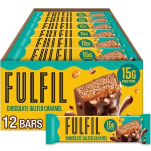 Indulge in a FULFIL Chocolate Salted Caramel protein bar packed with 15g of protein and vitamins, a delicious and gluten-free snack perfect for any time of day.