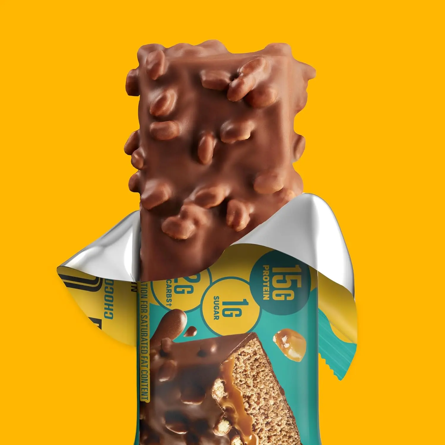 Indulge in a FULFIL Chocolate Salted Caramel protein bar packed with 15g of protein and vitamins, a delicious and gluten-free snack perfect for any time of day.