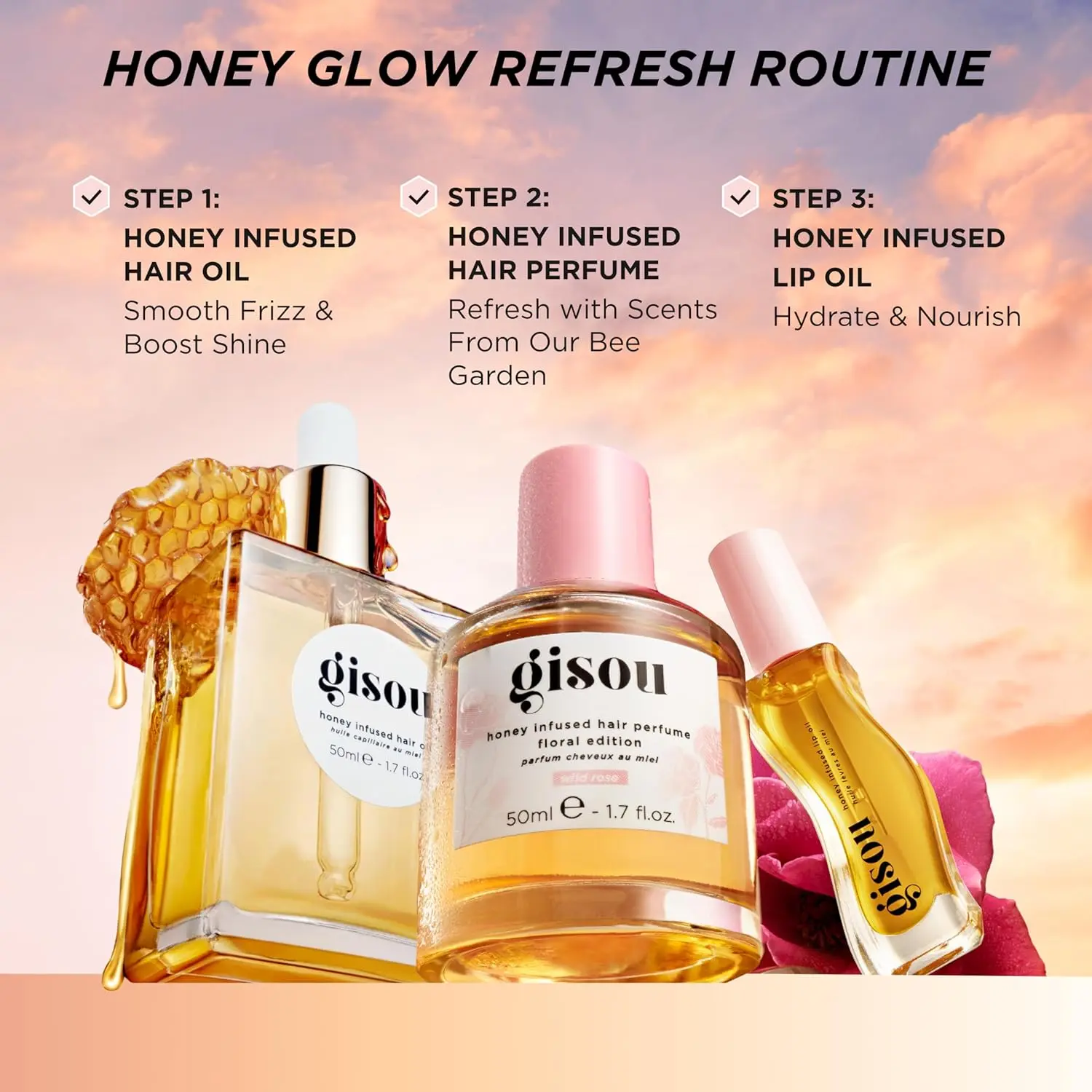 A small bottle of Gisou Honey Infused Hair Perfume in Wild Rose scent, designed to refresh and delicately scent hair with argan oil.