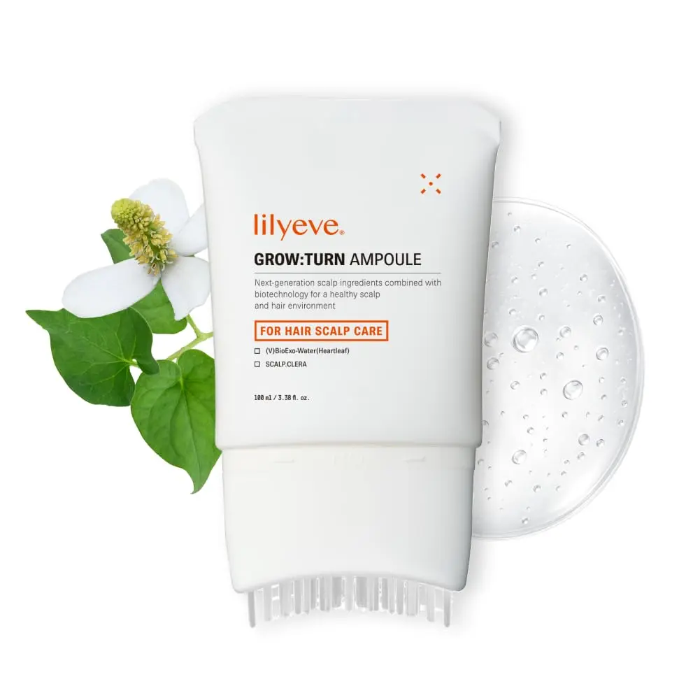 GROWTURN hair growth serum with built-in brush applicator for easy, targeted treatment of thinning hair and dry scalp.