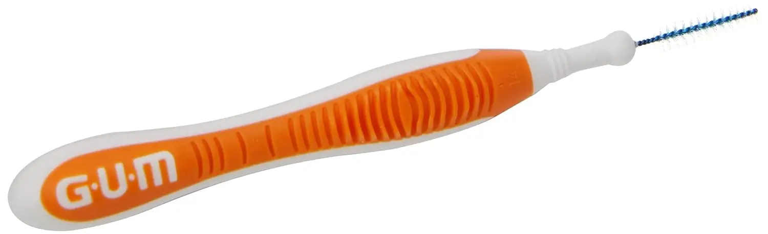 The Gum Trav-Ler interdental brush features an ergonomic handle and antibacterial bristles for effective plaque removal and gentle cleaning between teeth, even for those with implants or orthodontics.
