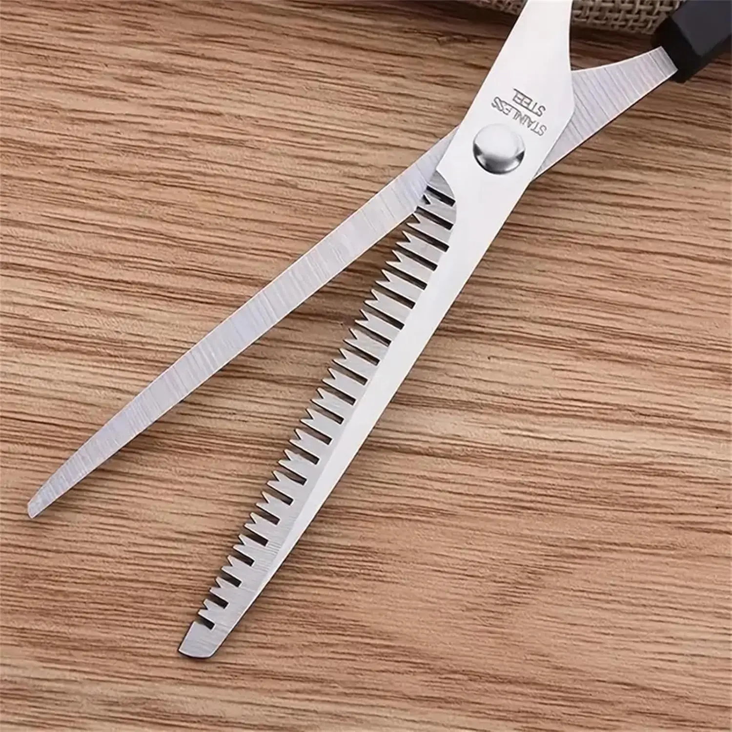 This three-piece stainless steel hair cutting set includes shears, thinning scissors, and a comb for professional or home use on men, women, and pets.