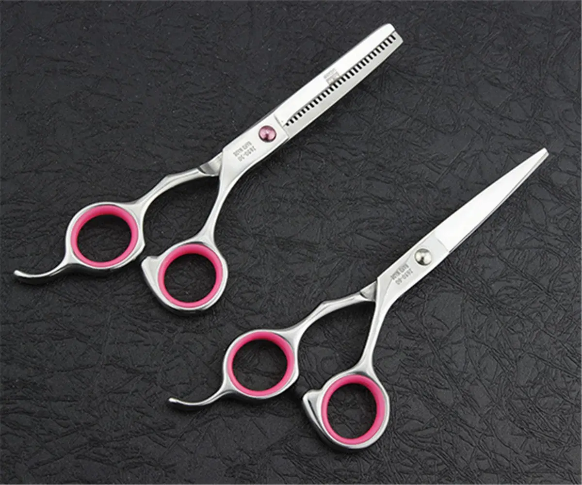 A 6-inch rose red professional hair cutting shears set with a leather case, featuring micro-serrated blades and an adjustable tension screw for home or barber use.