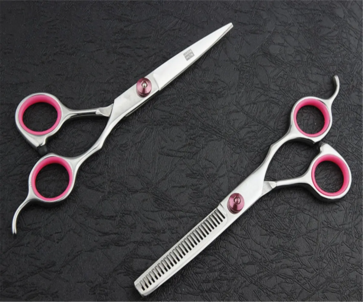A 6-inch rose red professional hair cutting shears set with a leather case, featuring micro-serrated blades and an adjustable tension screw for home or barber use.