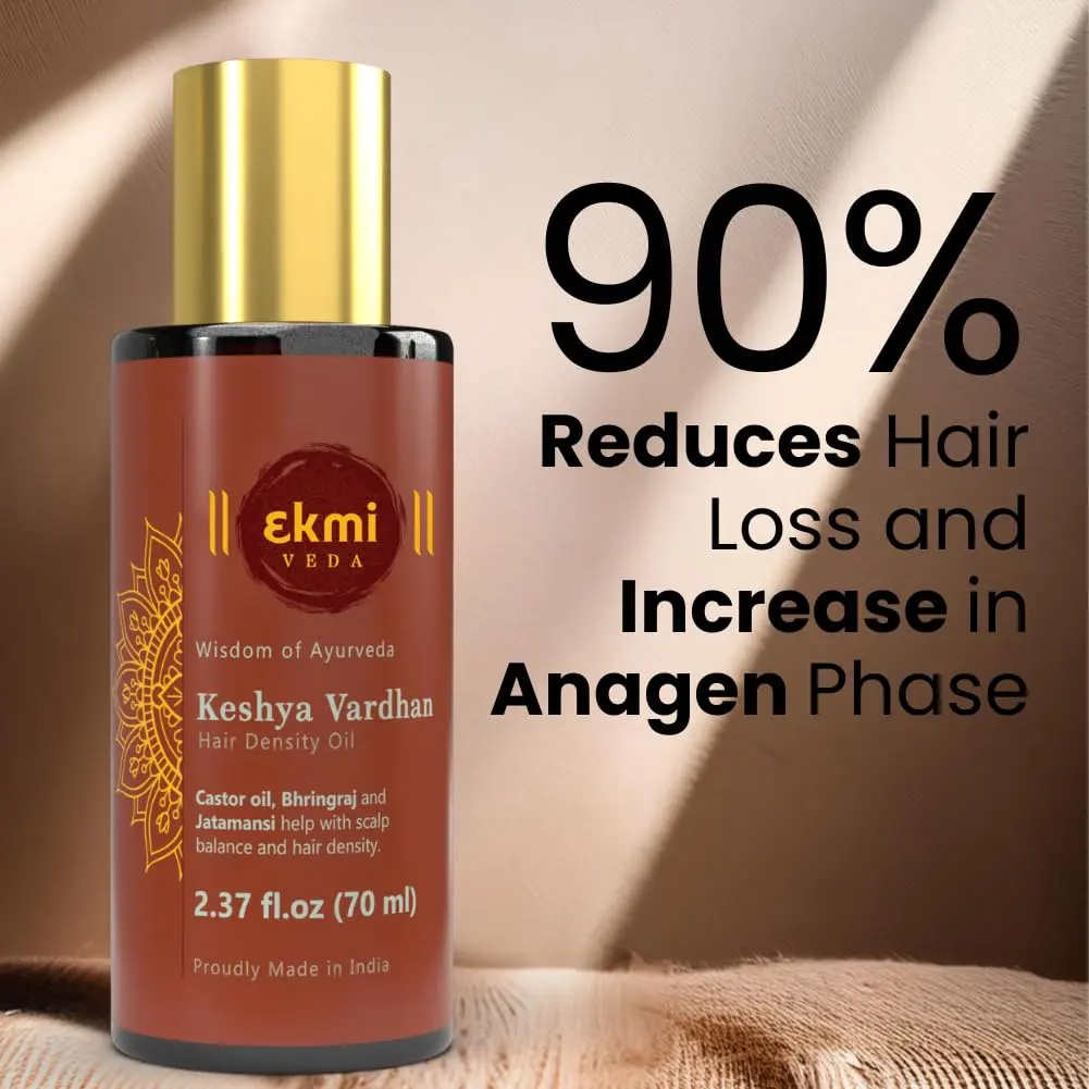 Ayurvedic hair growth oil infused with rosemary, castor, and bhringraj in a bottle, designed to promote hair density and prevent hair loss for both women and men.