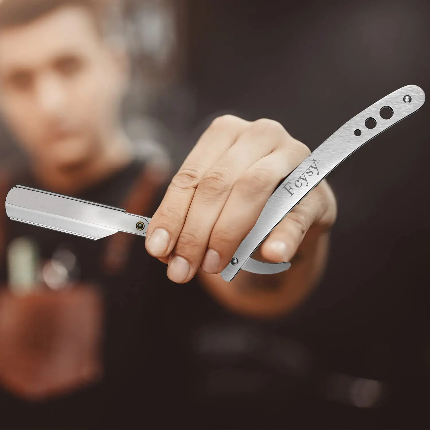 This professional hair cutting kit includes stainless steel barber shears, thinning shears, a straight edge razor, and accessories for easy haircuts at home or in the salon.