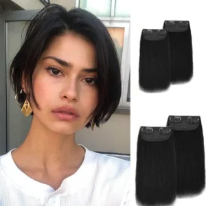 Four black synthetic clip in hair toppers provide extra volume and blend seamlessly for a natural look, perfect for women with thinning hair.