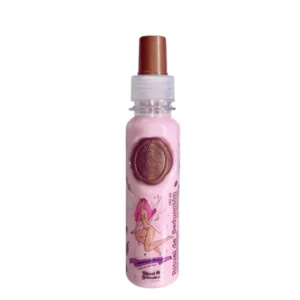 Pink bottle of Ritual Botanico alcohol-free heat protectant hair perfume with floral and fruity fragrance, designed to detangle, control frizz, and protect all hair types from heat and sun damage.