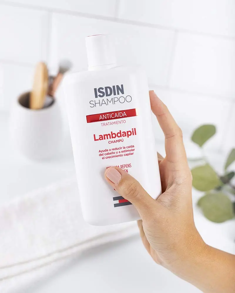 Isdin Lambdapil shampoo helps reduce hair loss and stimulate follicle growth for denser, stronger, and more voluminous hair in both men and women.