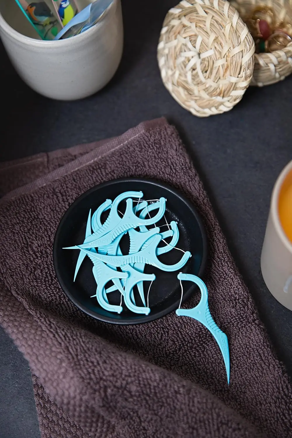 Jordan 3-in-1 dental flossers with toothpick and tongue scraper, made with 50% recycled plastic, effectively remove plaque for a fresh, beautiful smile.