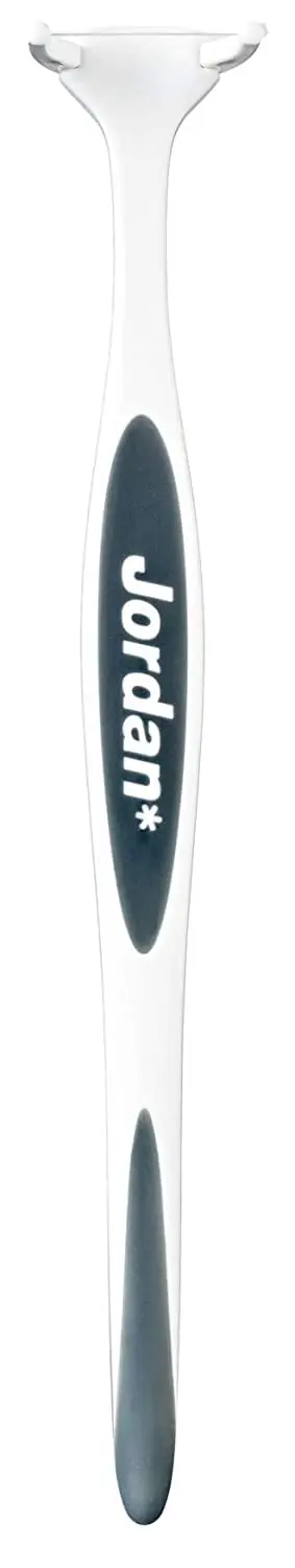 Jordan Easy Clean Flosser with assorted color handle and floss refills, designed to gently slide floss between teeth and easily clean back teeth with easy to change refills.