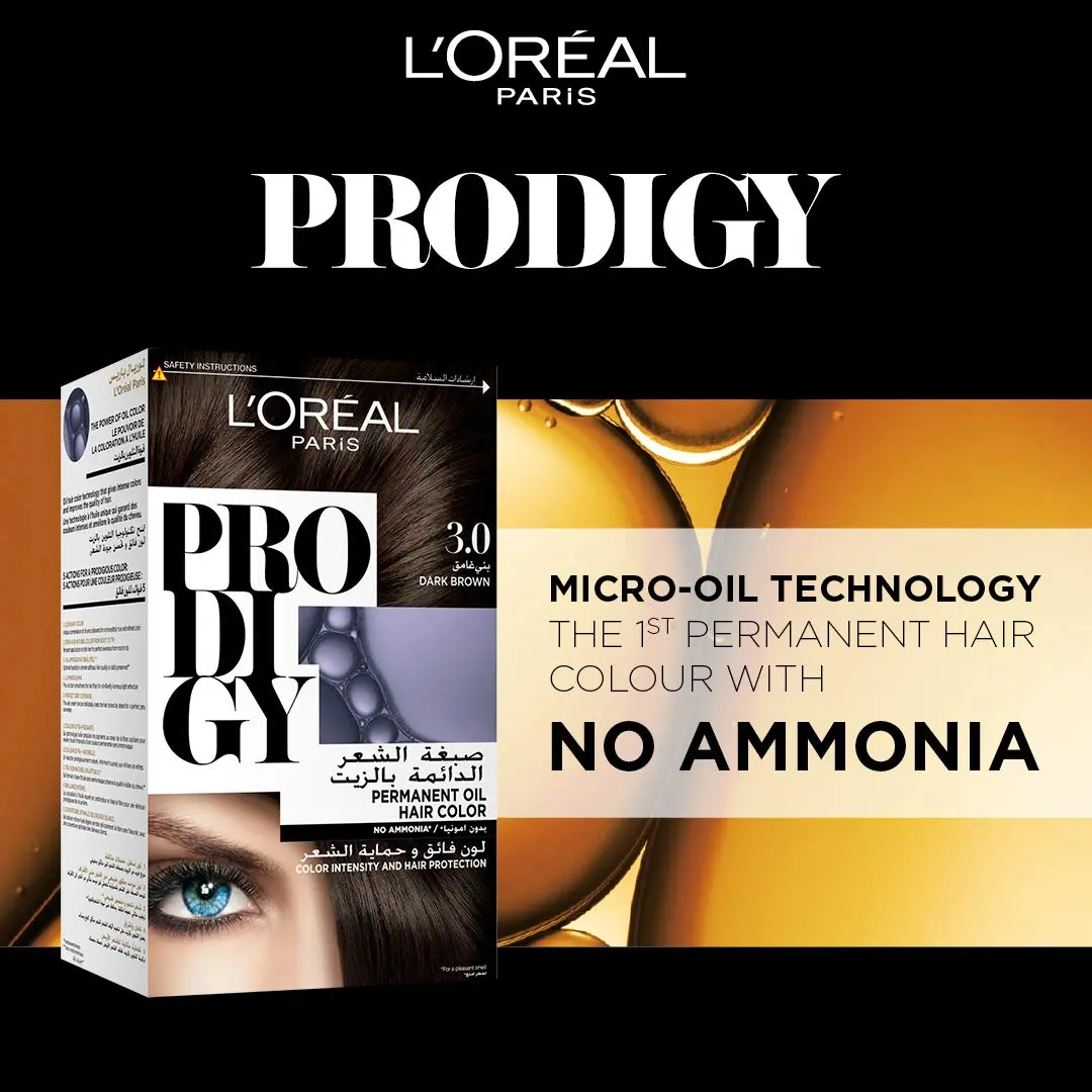 A box of L'Oréal Paris Prodigy 3.0 Dark Brown ammonia-free oil hair color that provides 100% gray coverage, vibrant color, and radiant shine for up to 8 weeks with Argan oil.