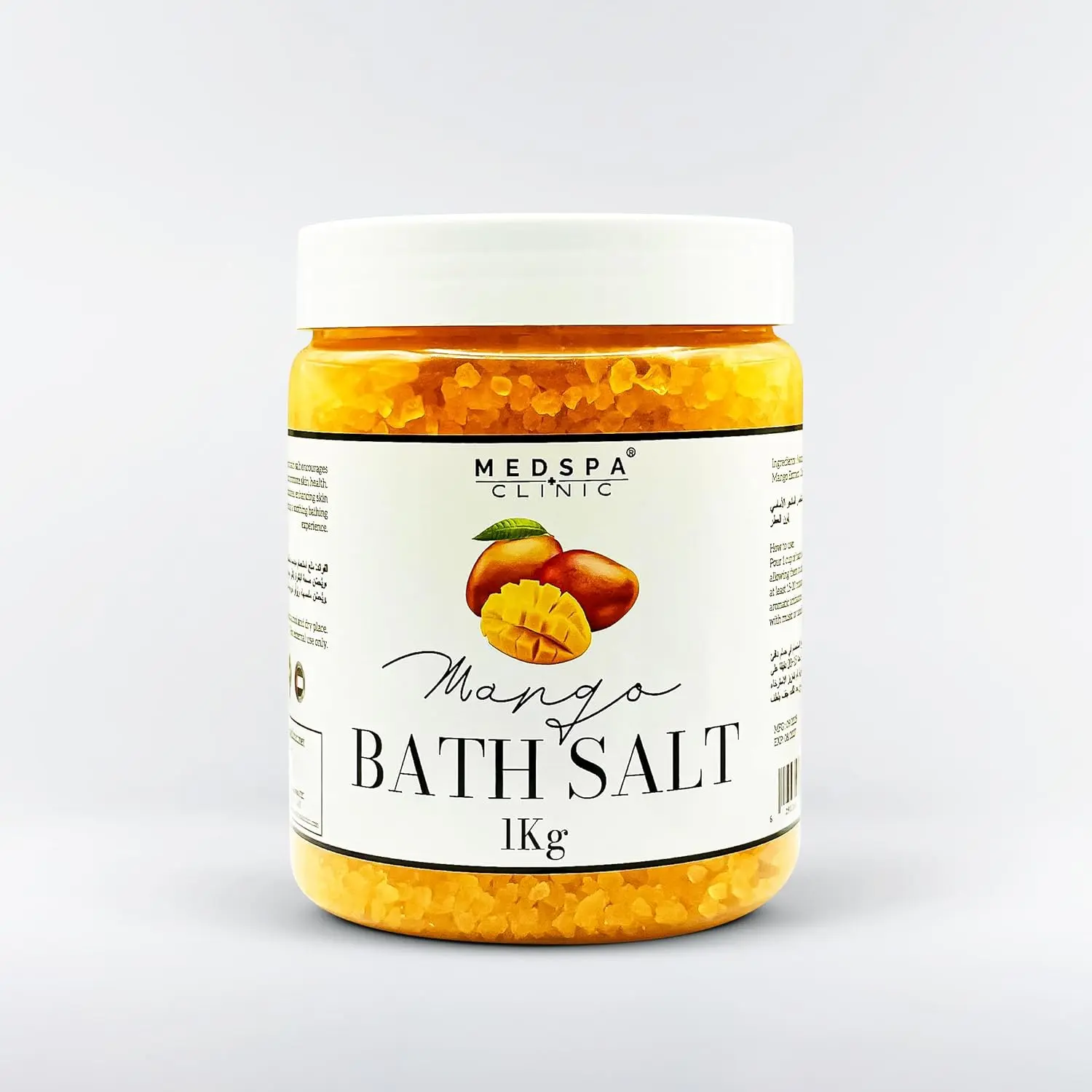 Close-up of fragrant mango bath salt crystals dissolving in warm water, creating a relaxing and aromatic spa experience for full body and foot soaks.