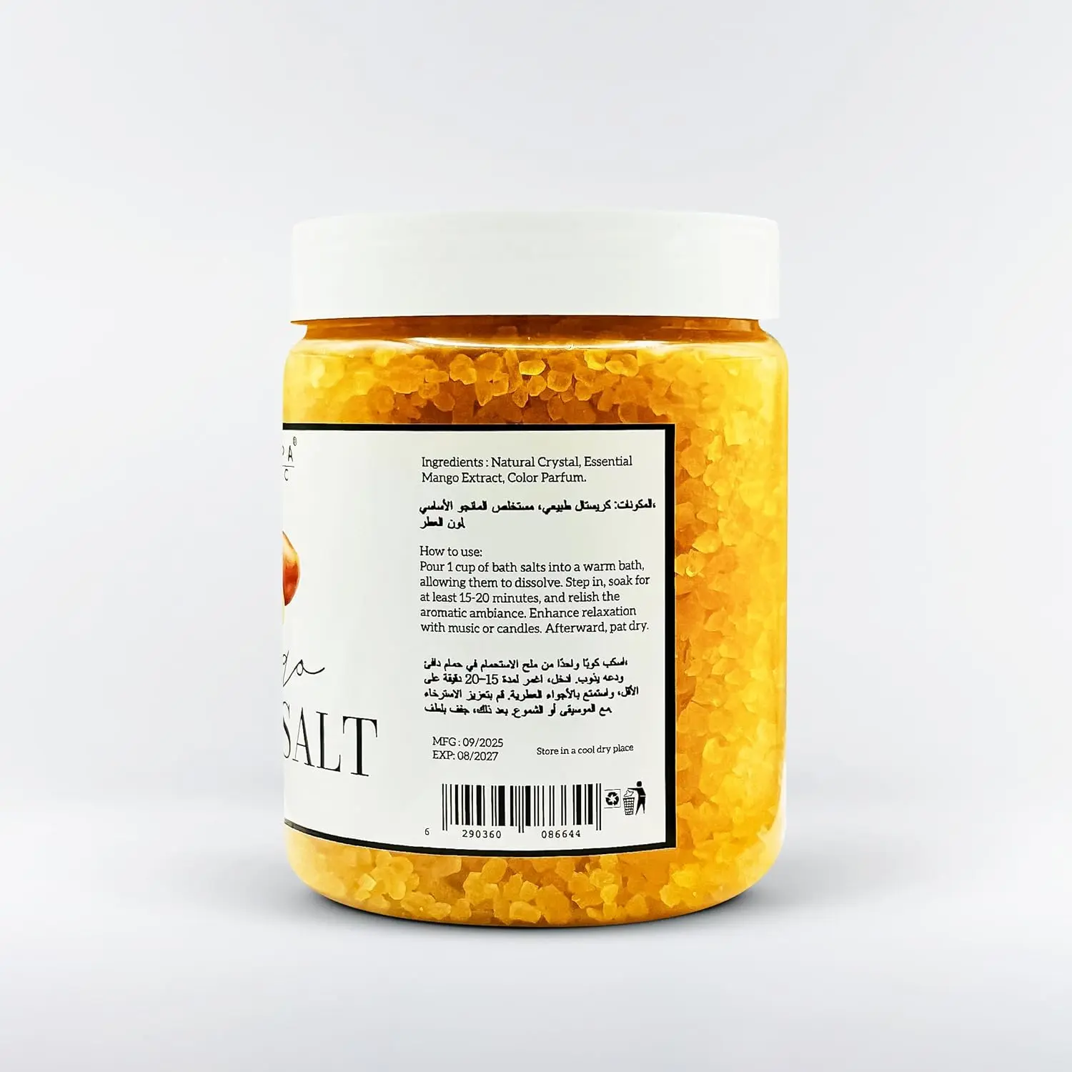 Close-up of fragrant mango bath salt crystals dissolving in warm water, creating a relaxing and aromatic spa experience for full body and foot soaks.