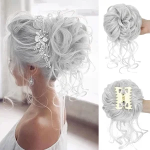 Silver grey messy bun hair piece with claw clip attachment creating a quick and easy tousled updo hairstyle for women.