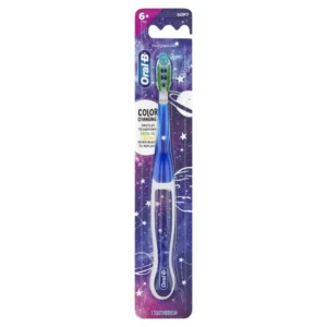 Oral-B Cross Action toothbrush designed for kids ages 6 and up, featuring soft bristles and a textured tongue cleaner for effective plaque removal.