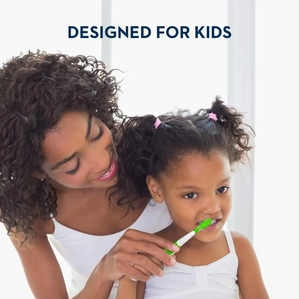 Oral-B Cross Action toothbrush designed for kids ages 6 and up, featuring soft bristles and a textured tongue cleaner for effective plaque removal.