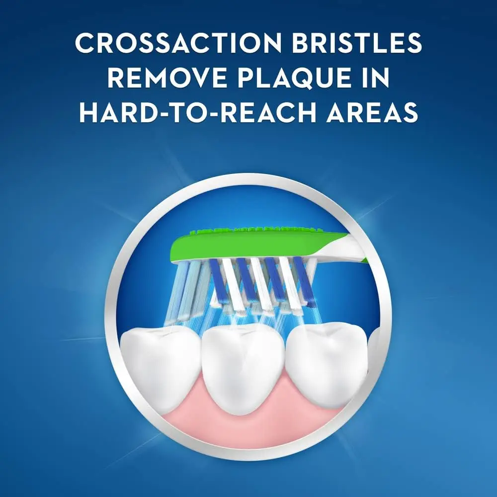 Oral-B Cross Action toothbrush designed for kids ages 6 and up, featuring soft bristles and a textured tongue cleaner for effective plaque removal.