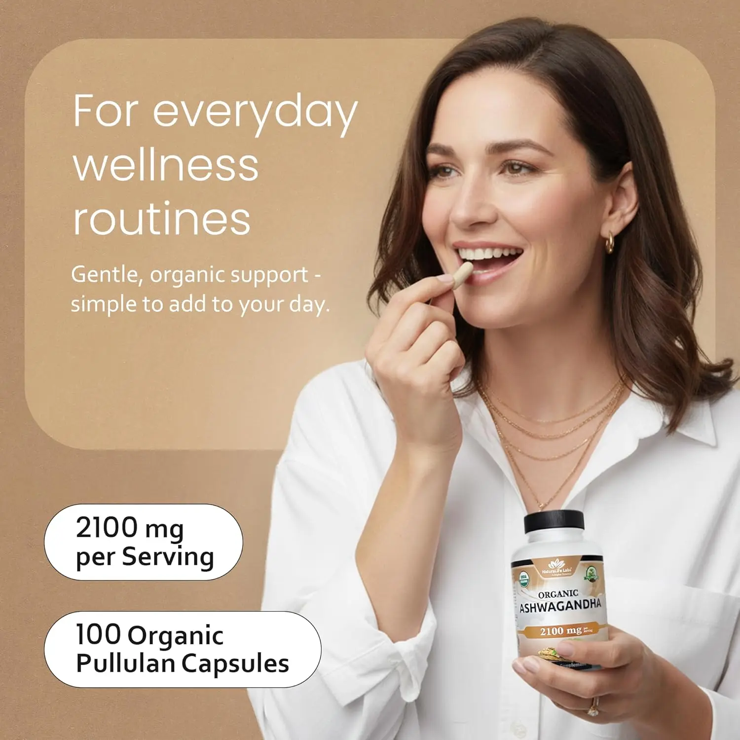 Bottle of 100 vegan capsules containing 2100mg of organic ashwagandha powder and root extract for natural anxiety relief and mood enhancement.