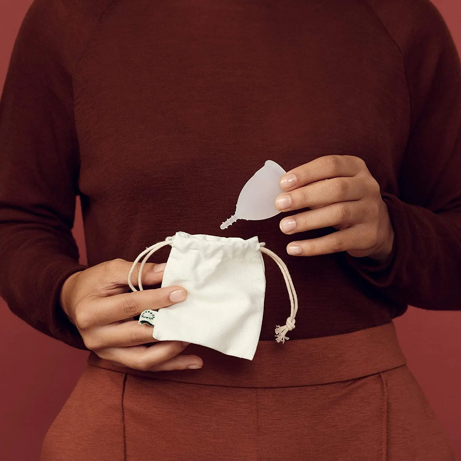 The OrganiCup AllMatters menstrual cup in Size A is made of soft medical-grade silicone, ideal for those who haven't given birth, and comes with an organic cotton pouch.