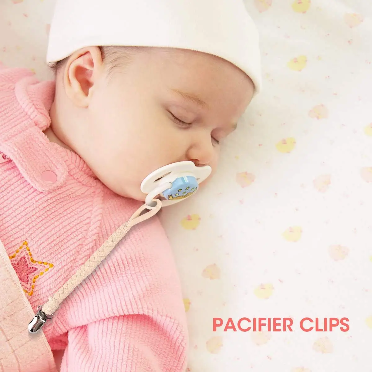 Four colorful pacifier clips securely attached to baby clothes, keeping pacifiers clean and within reach for boys and girls.