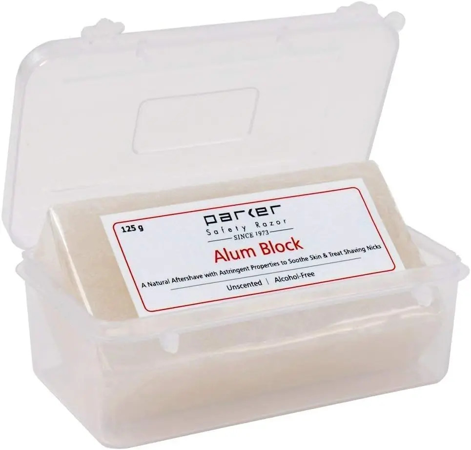 Parker Safety Razor's 125G alum block is a natural antiseptic aftershave treatment that tightens pores and treats minor cuts, packaged in a convenient travel case.