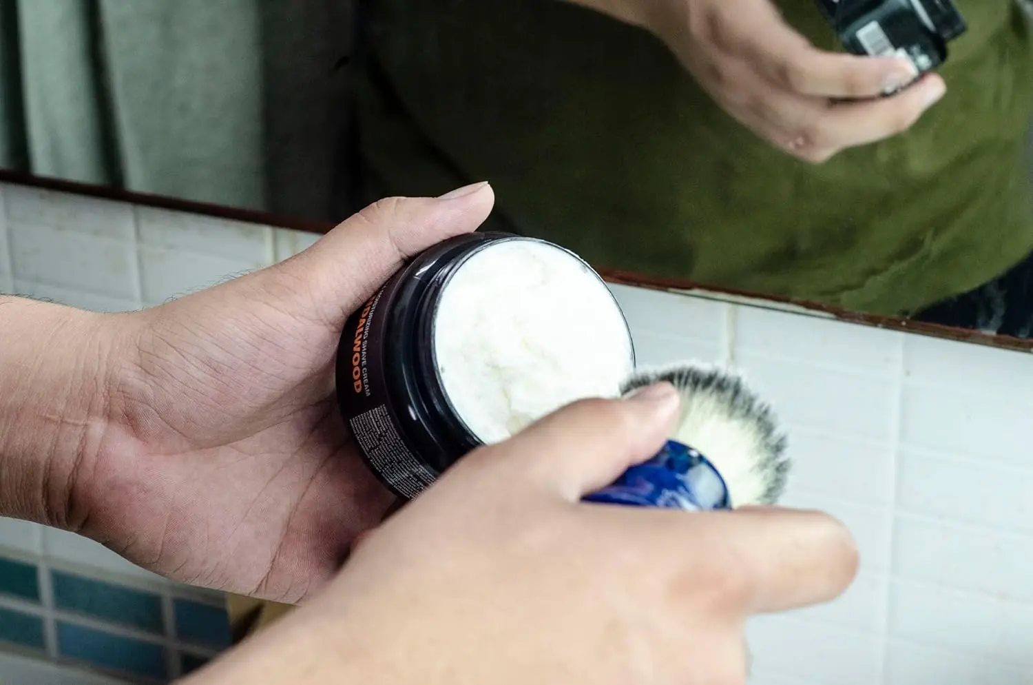 Pink Woolf shaving combo for men with a blue handled synthetic shaving brush and Oudh & Sandalwood shaving cream for a close, comfortable shave.