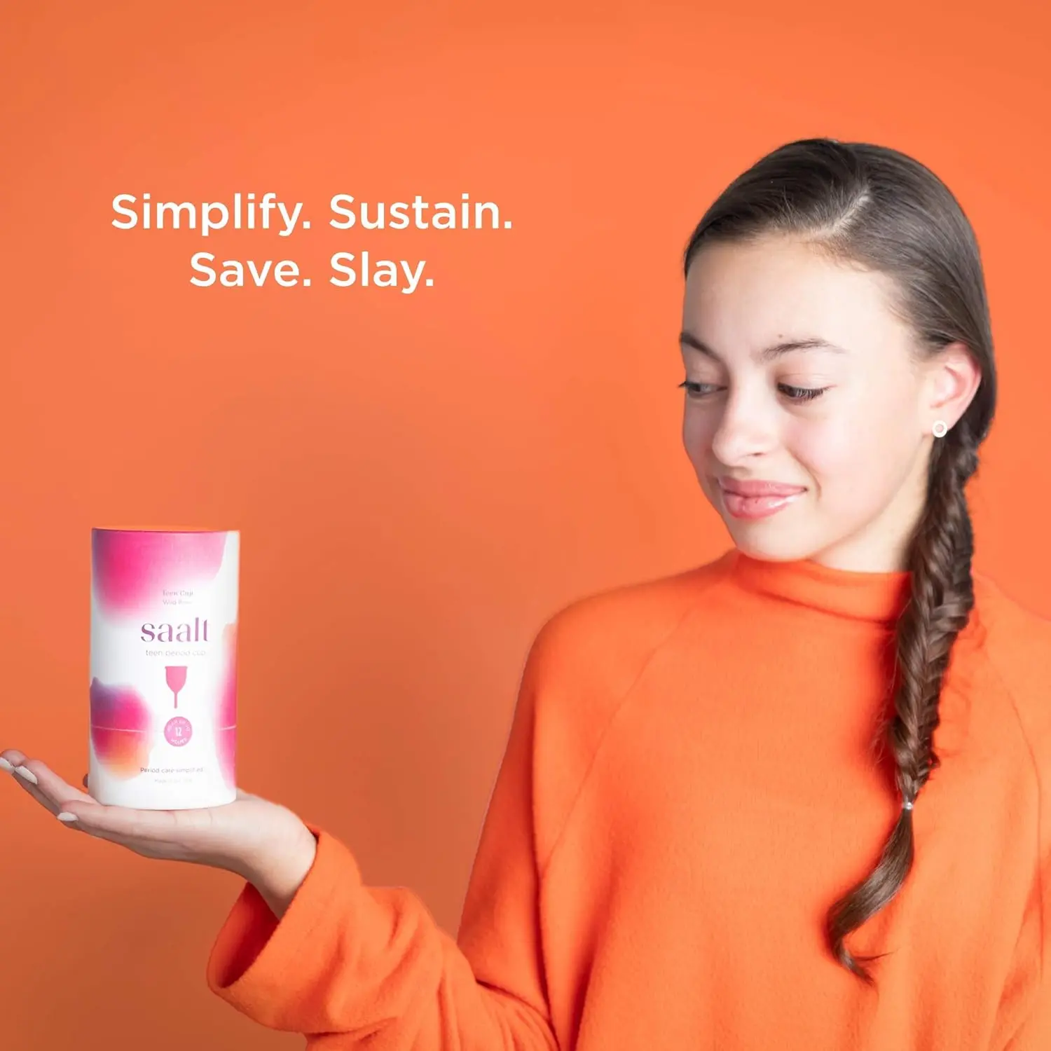 A wild rose Saalt teen menstrual cup offers up to 12 hours of leak-free, reusable period protection as a comfortable and sustainable alternative to tampons and pads.