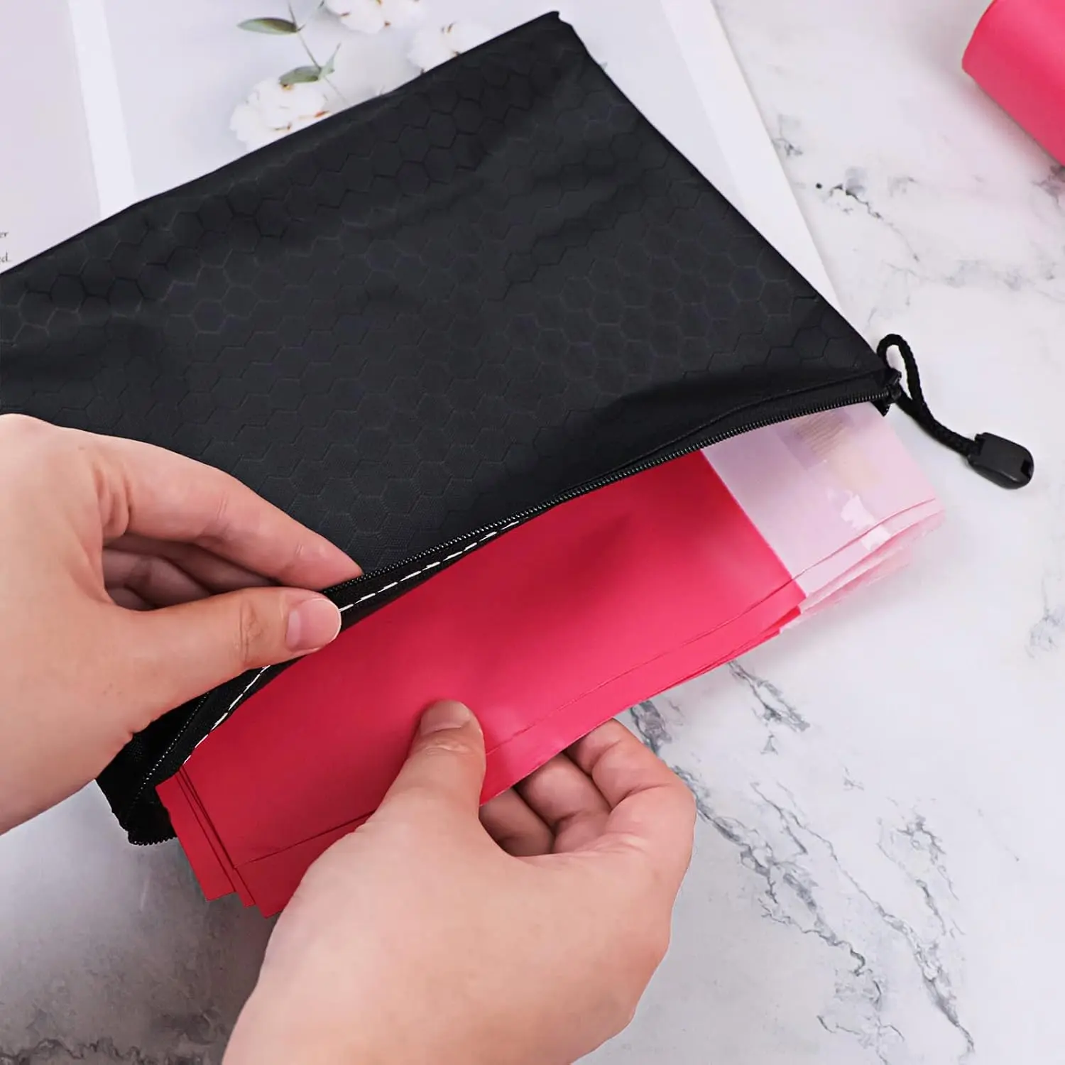 Pink sanitary disposal bags for discreetly disposing of tampons, pads, and liners, featuring an opaque design and included storage bag.