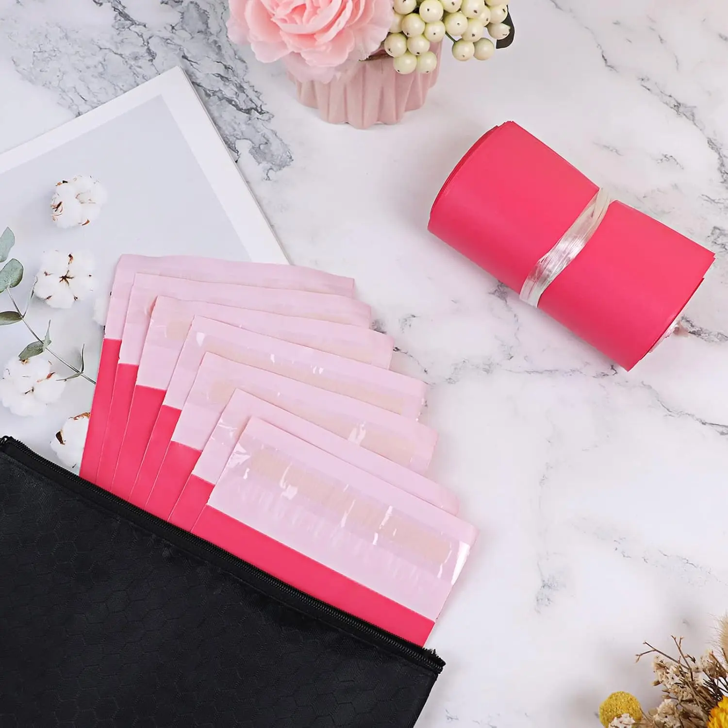 Pink sanitary disposal bags for discreetly disposing of tampons, pads, and liners, featuring an opaque design and included storage bag.