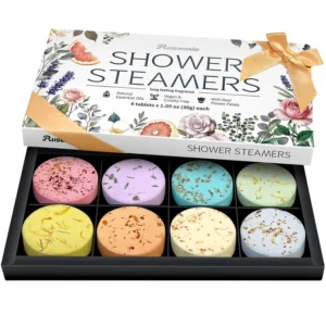 RUSEMLE shower steamers gift set in a luxury box with a satin bow, containing eight aromatherapy tablets with unique scents for a relaxing spa experience.