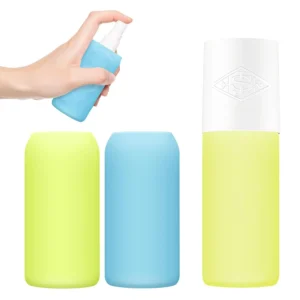 Yellow and blue silicone cover provides light-blocking and temperature control protection for a Sol de Janeiro hair and body perfume mist bottle during travel.