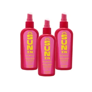 Three bottles of Sun In Original Spray-In Hair Lightener in Tropical Breeze scent gradually lightens hair for a natural, sun-kissed look.