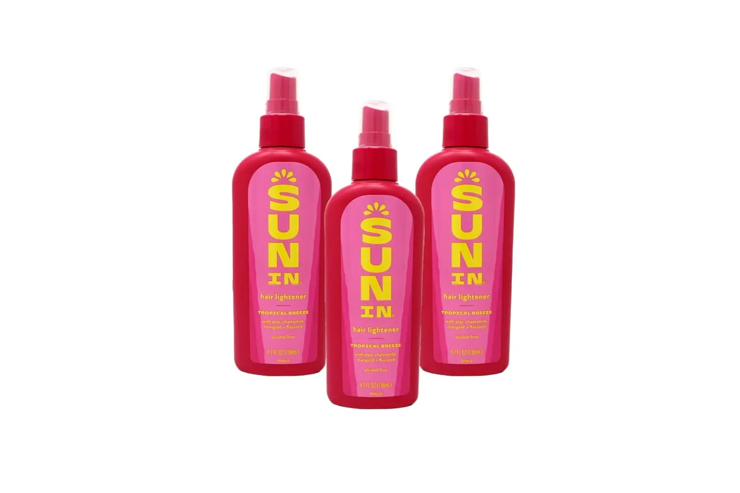 Three bottles of Sun In Original Spray-In Hair Lightener in Tropical Breeze scent gradually lightens hair for a natural, sun-kissed look.