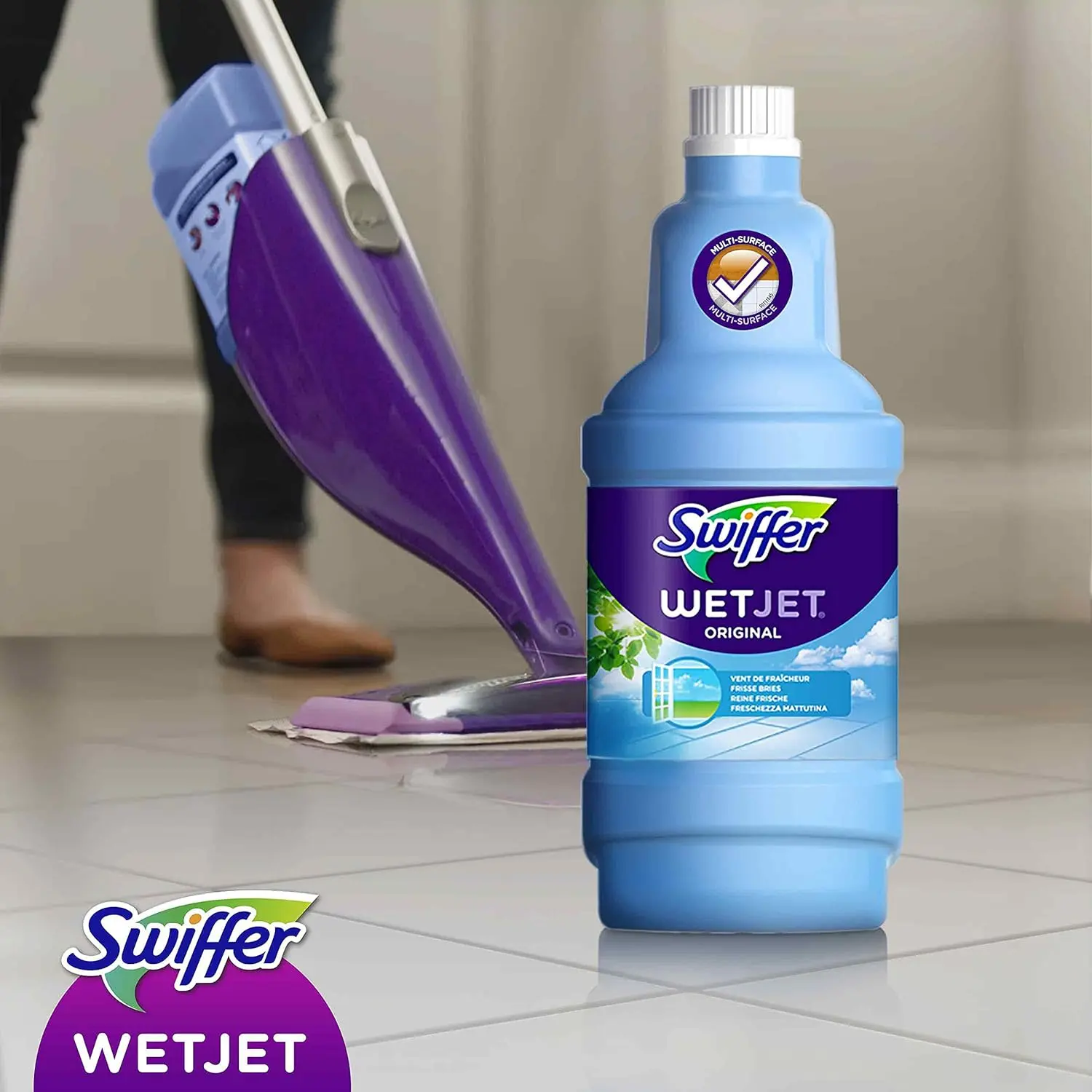 This is a bottle of Swiffer WetJet Multi-Purpose floor cleaner refill, designed to trap dirt and safely clean all floor types with an Open Window Fresh scent.